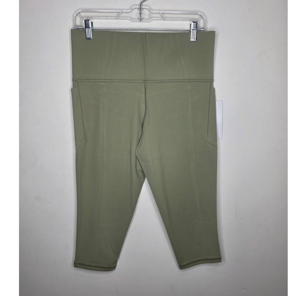 NWT Athleta Salutation Stash Pocket Capri leggings - shadow olive green - 1x